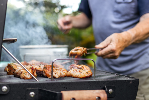 Man grilling food
